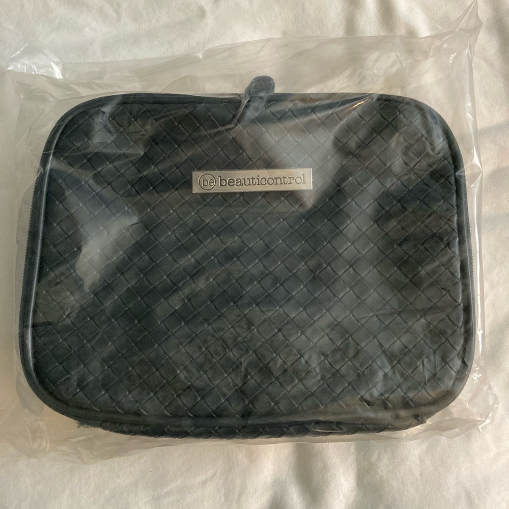 BeautiControl black zippered bag faux leather